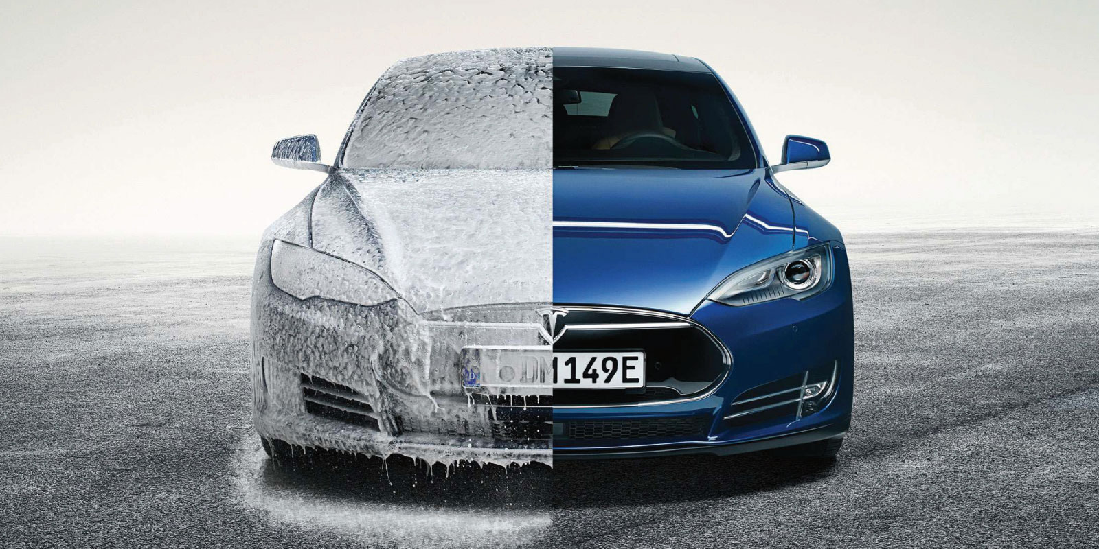 A picture of a car covered with cleaning foam.