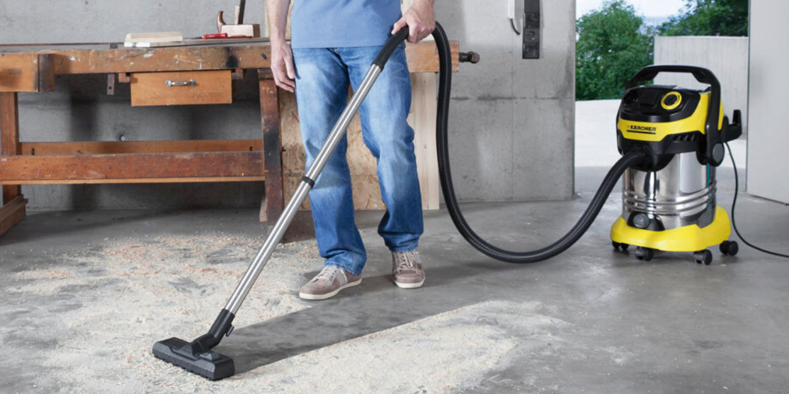 A picture of a Kärcher vacuum cleaner in use.